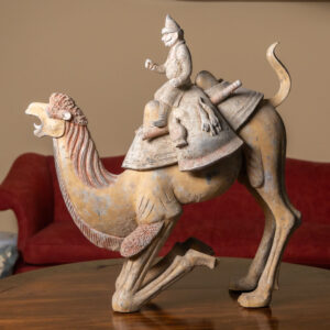 T'ang Dynasty Earthenware Figure of a Bactrian Camel with a Foreigner Riding on its Back
